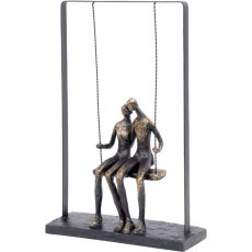 Couple Sitting on a Swing Sculpture